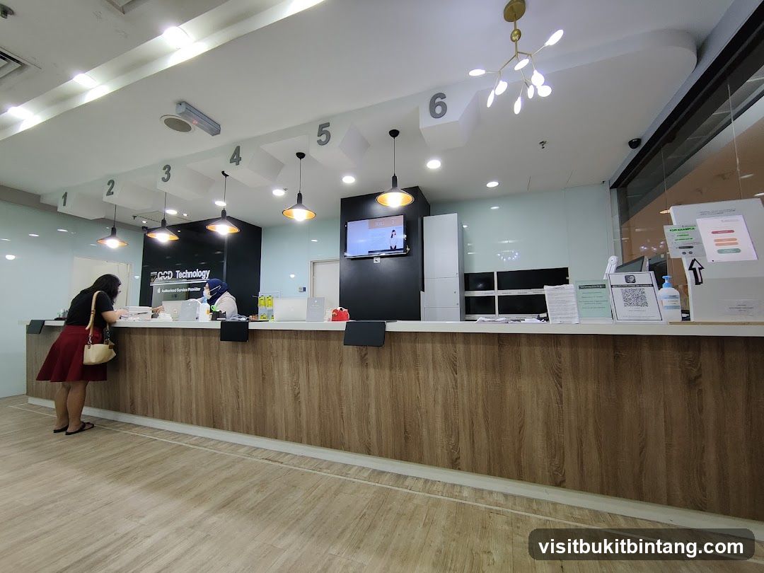 Reception Area with Counter and Staff