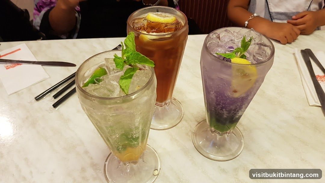 Three Cold Drinks on a Table