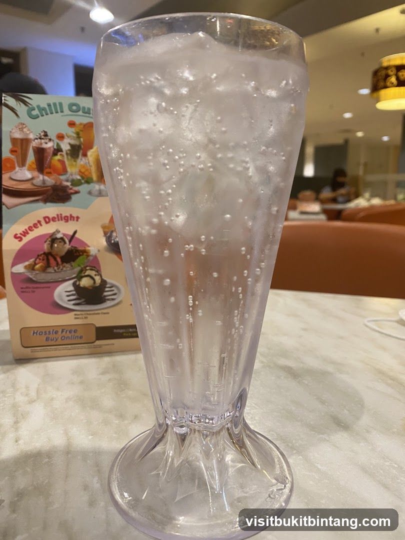 Glass of Sparkling Water with Menu Card