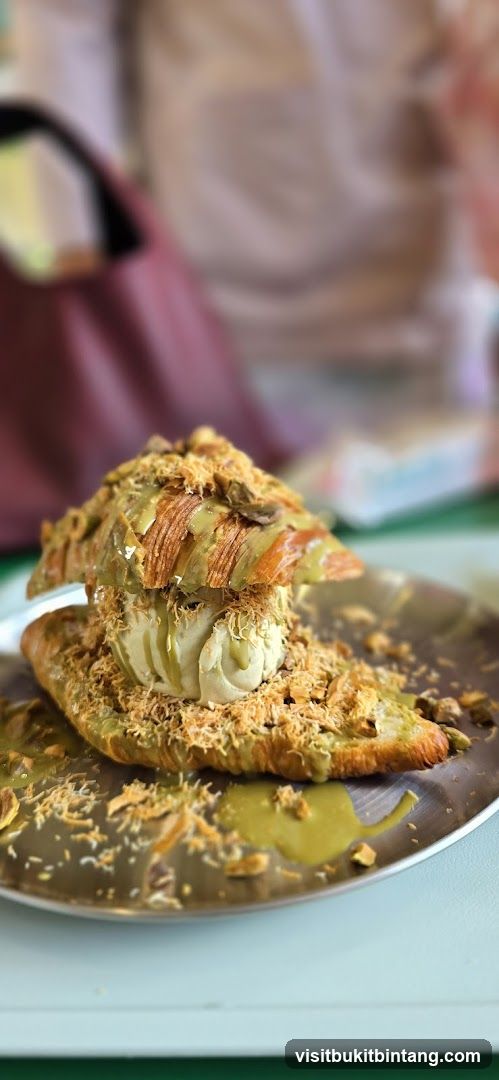 Croissant with Ice Cream and Pistachio Topping