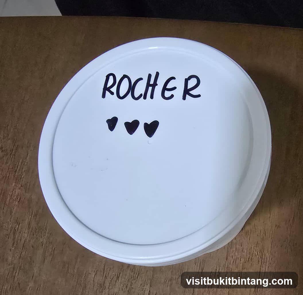 Container with "ROCHER" and hearts