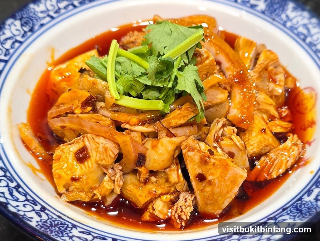 Spicy Chicken Dish with Cilantro Garnish