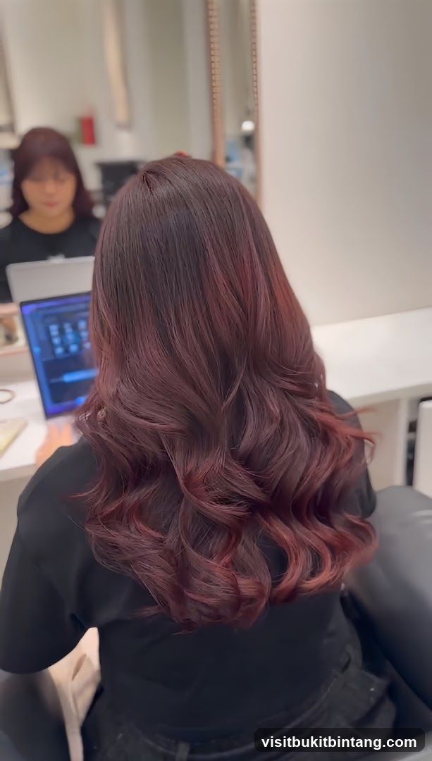 Woman with Burgundy Hair in Salon
