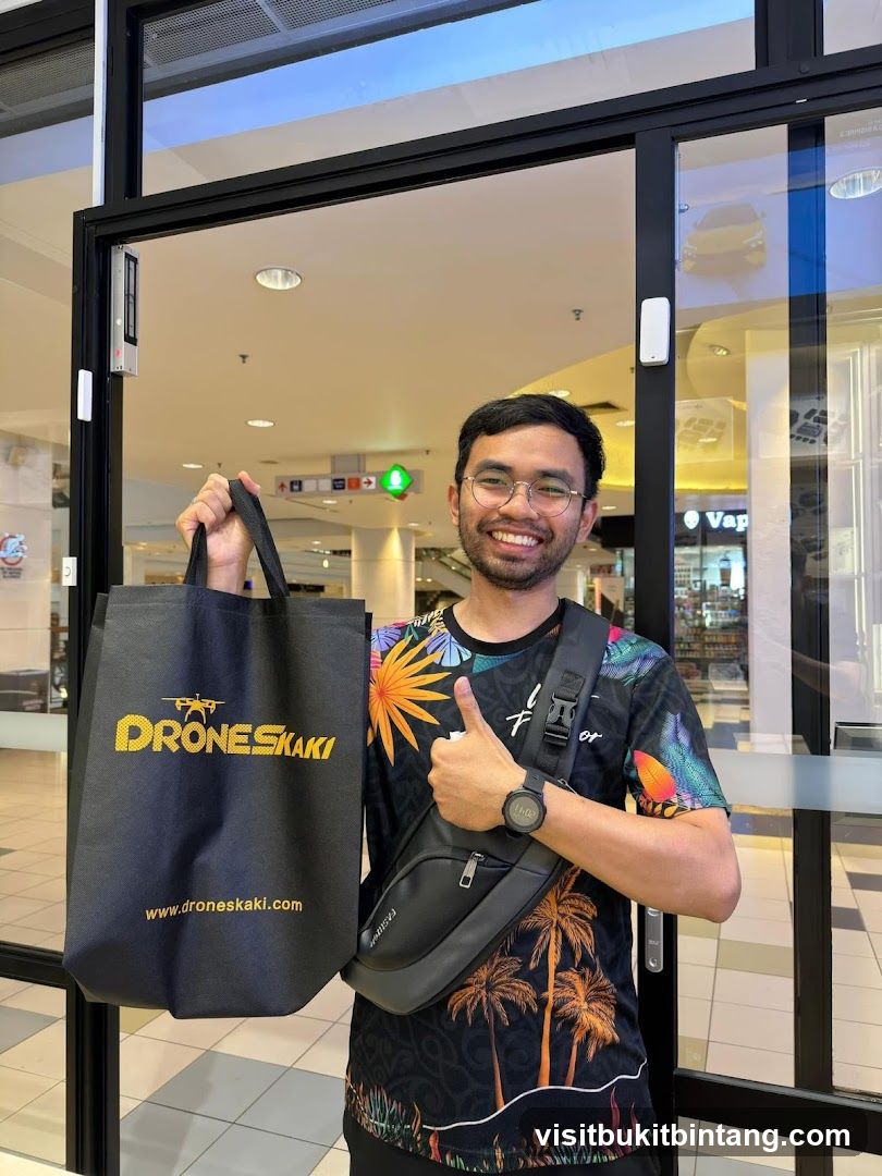 Person with shopping bag in mall