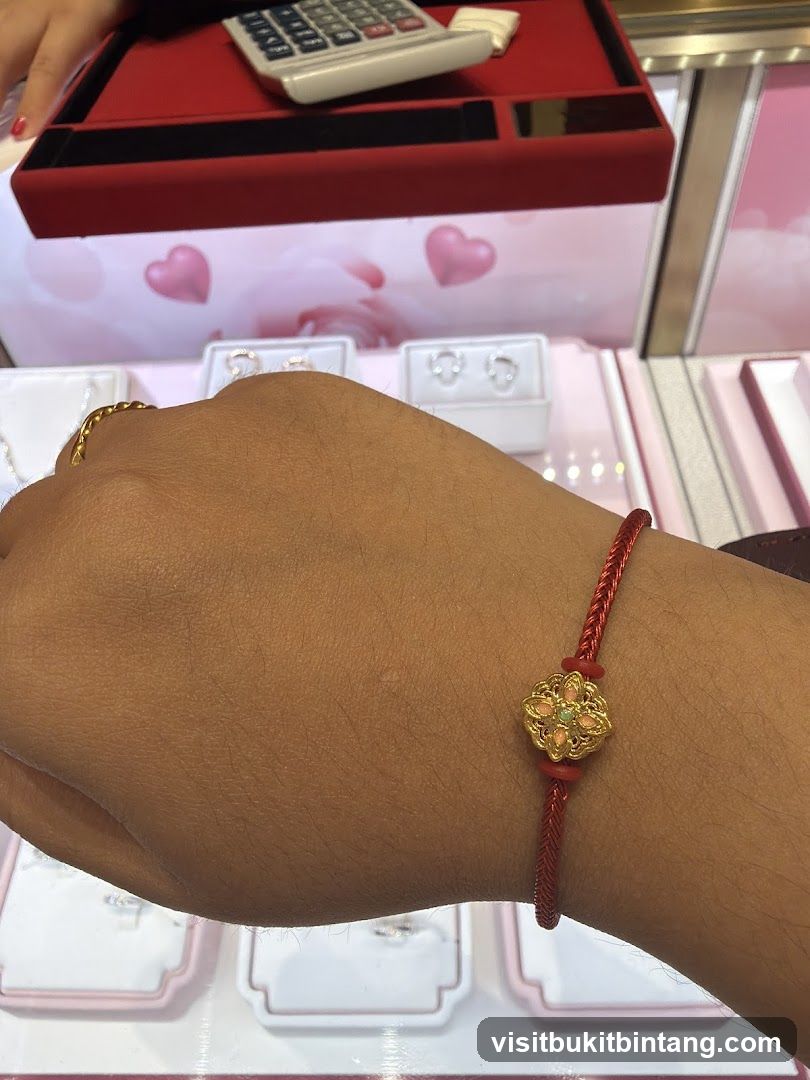 Hand wearing a bracelet in a jewelry store