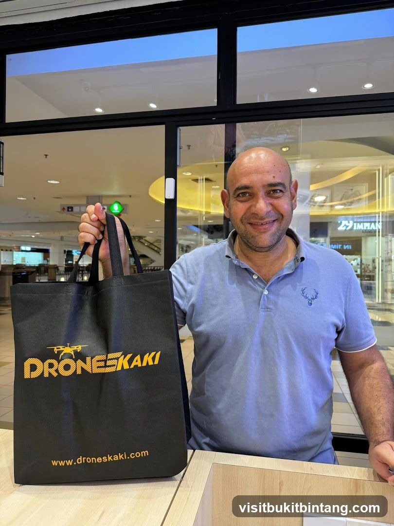 Man with Drone Shop Bag