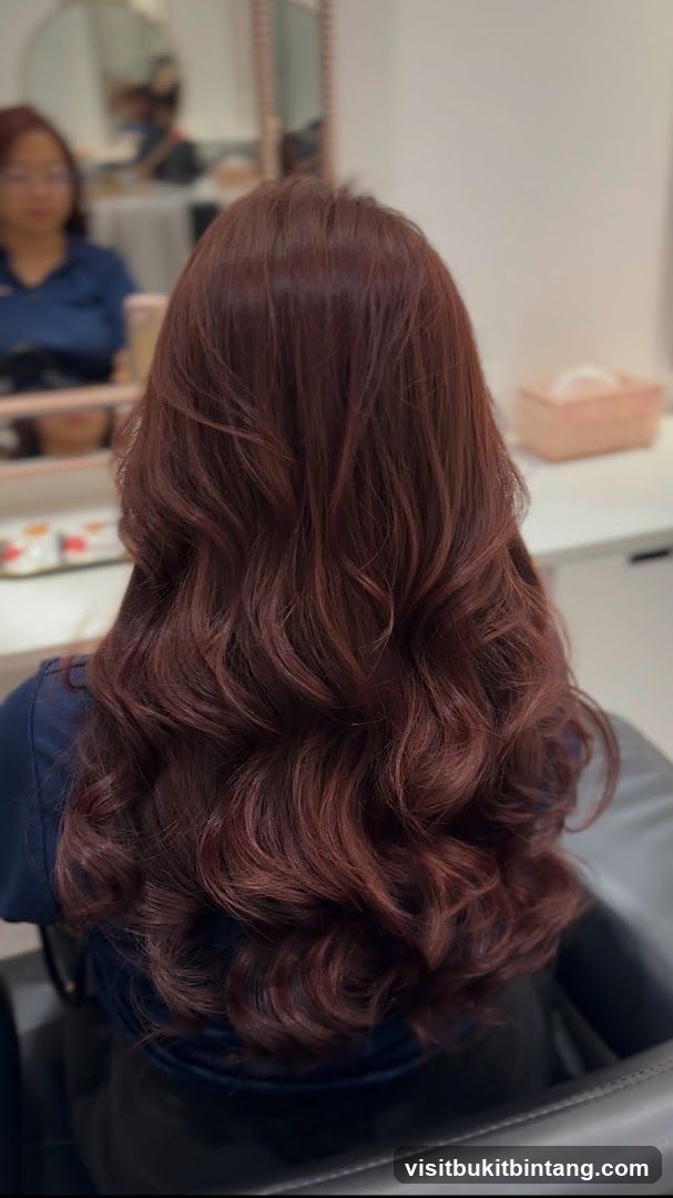 Woman with styled auburn hair