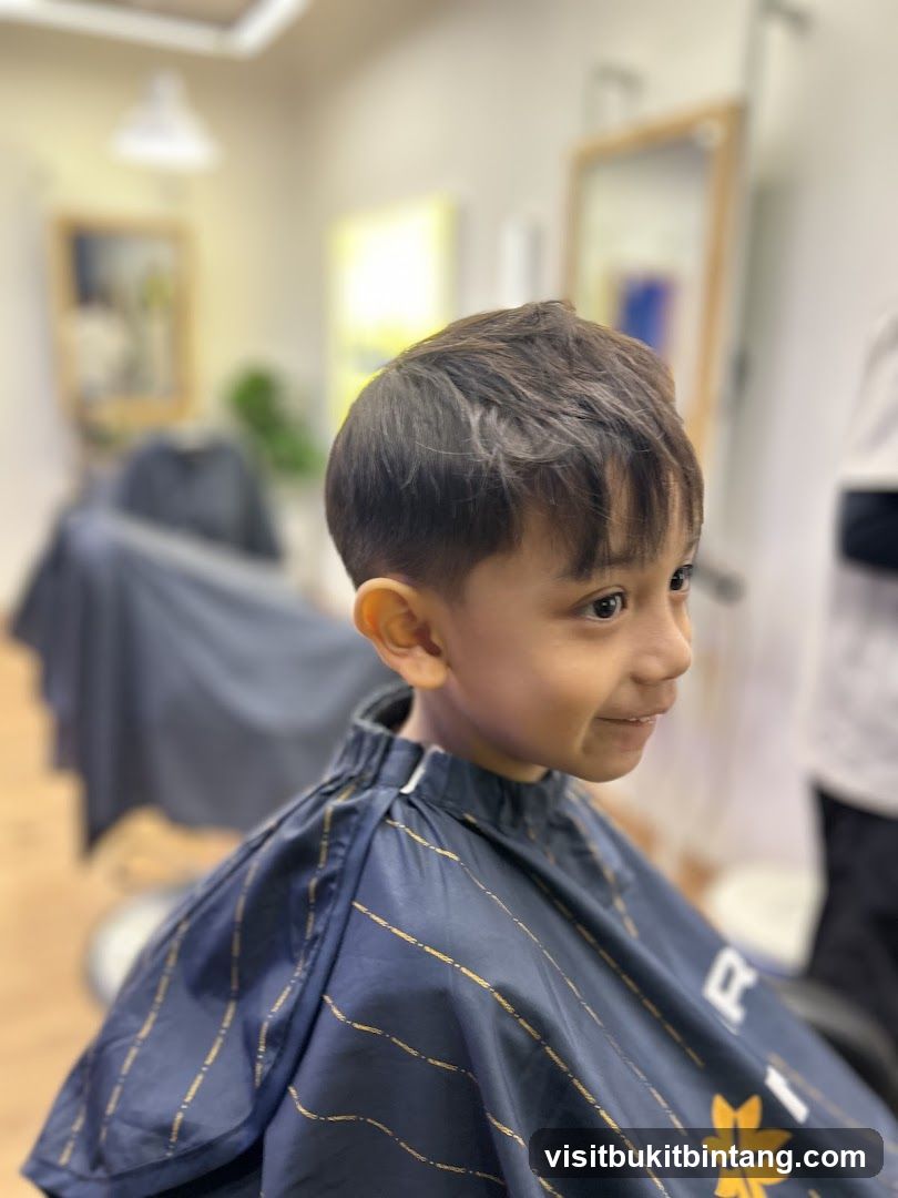 Young boy getting a haircut