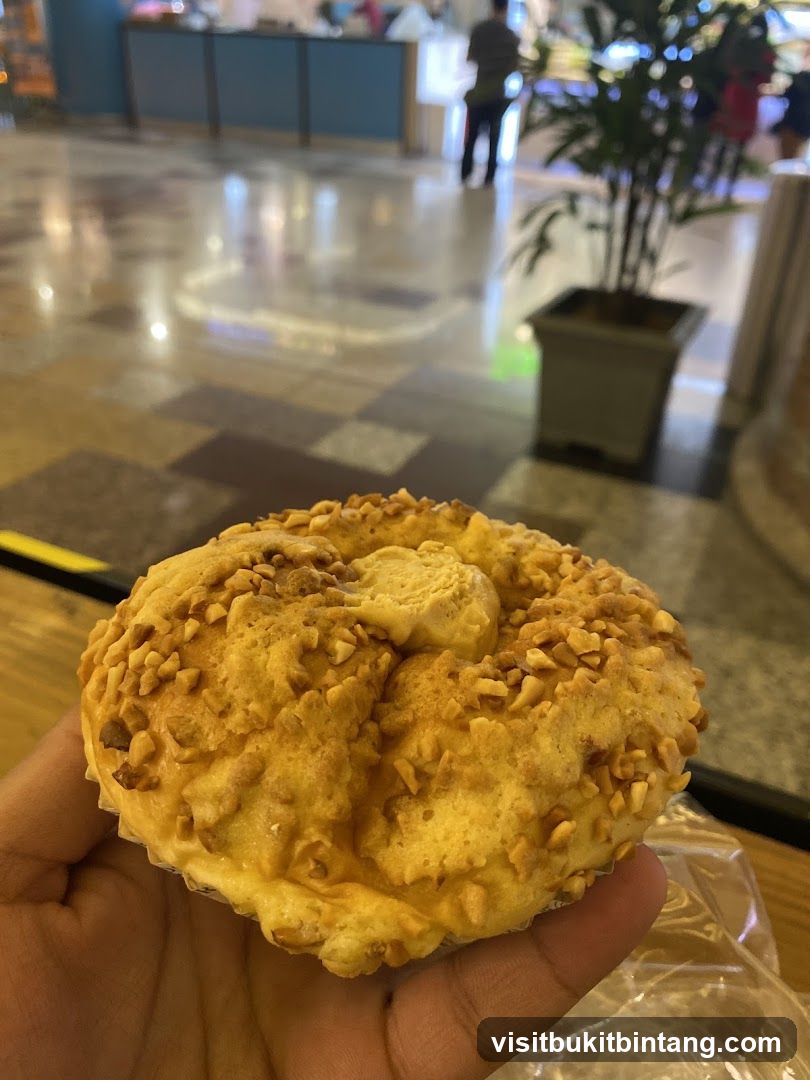 Handheld pastry in mall interior