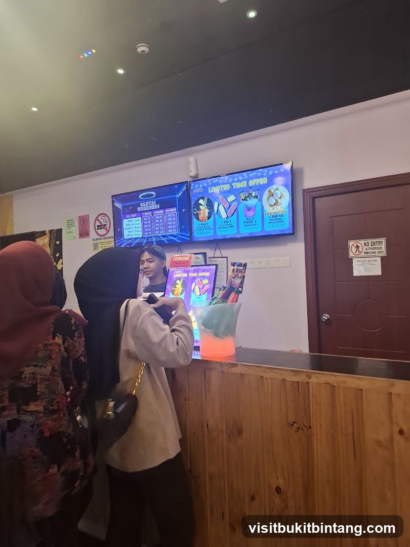 Counter with digital menus and customers