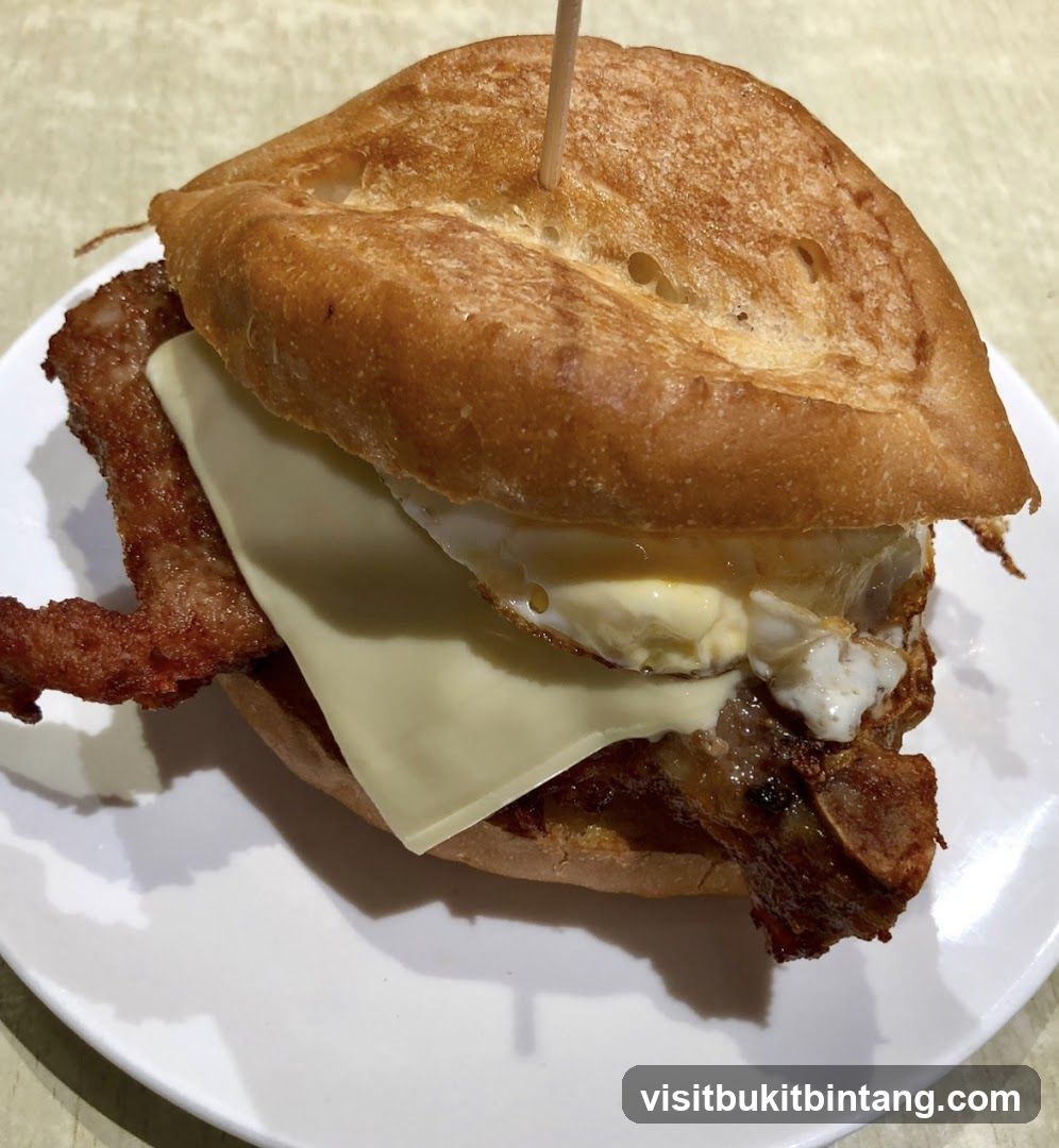 Pork Chop and Egg Sandwich
