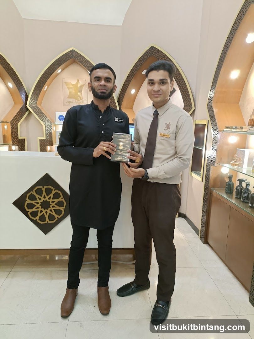 Two men holding a product in a store