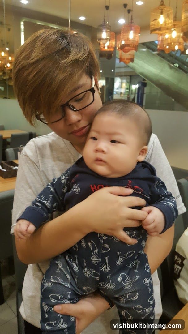 Person holding a baby