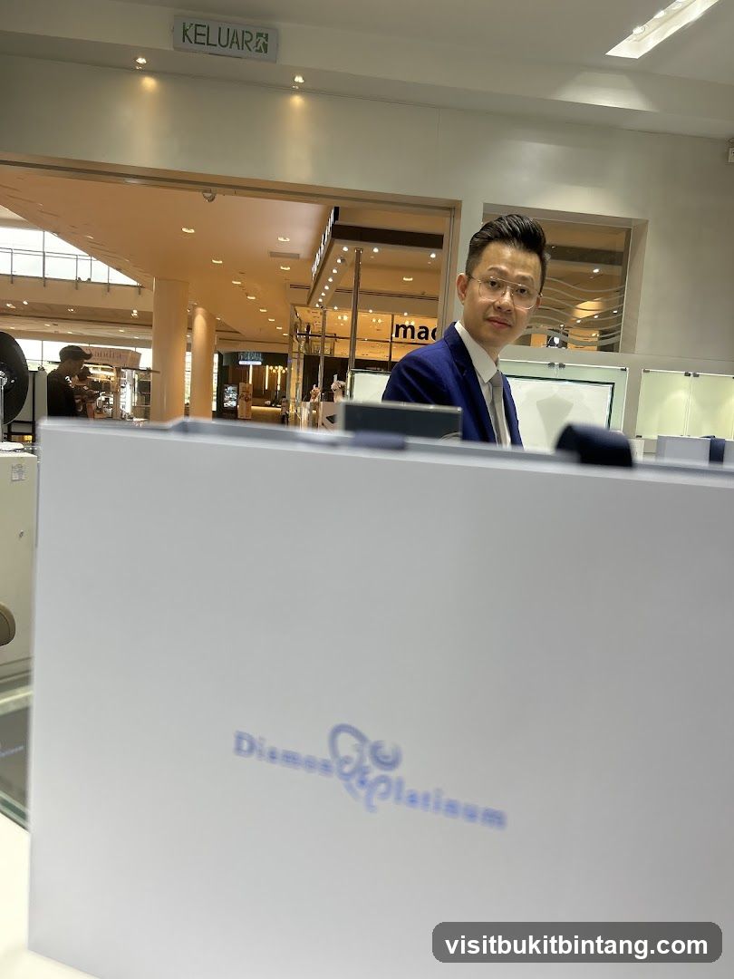 Man in a suit behind a counter