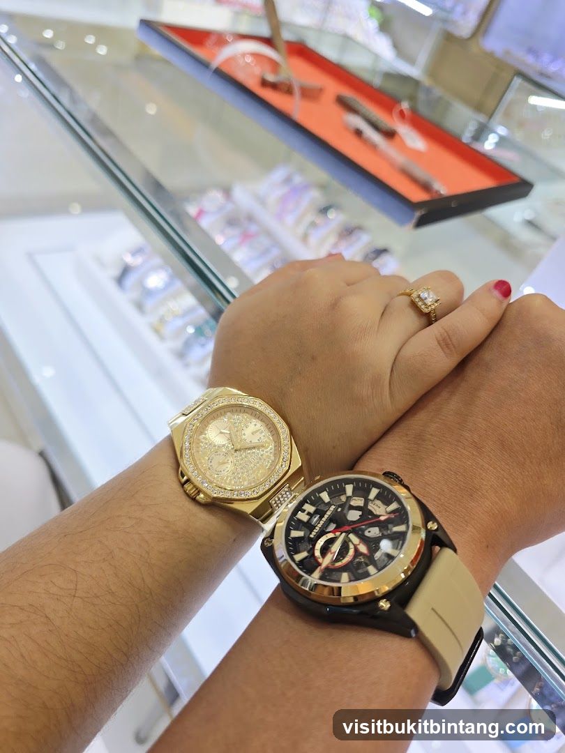 Two people showing off their watches