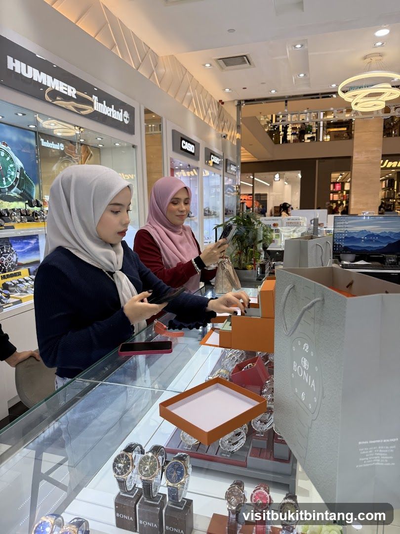 Customers browsing watches in a store