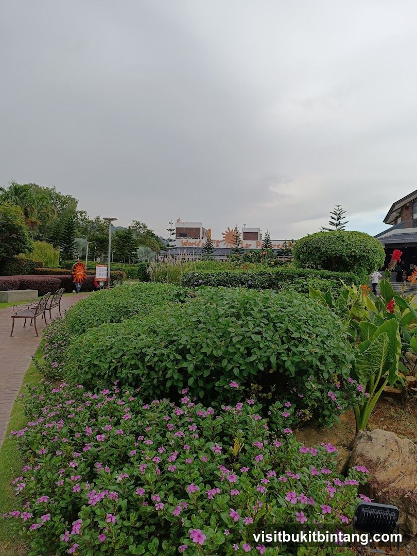 Landscaped Garden with Buildings in Background