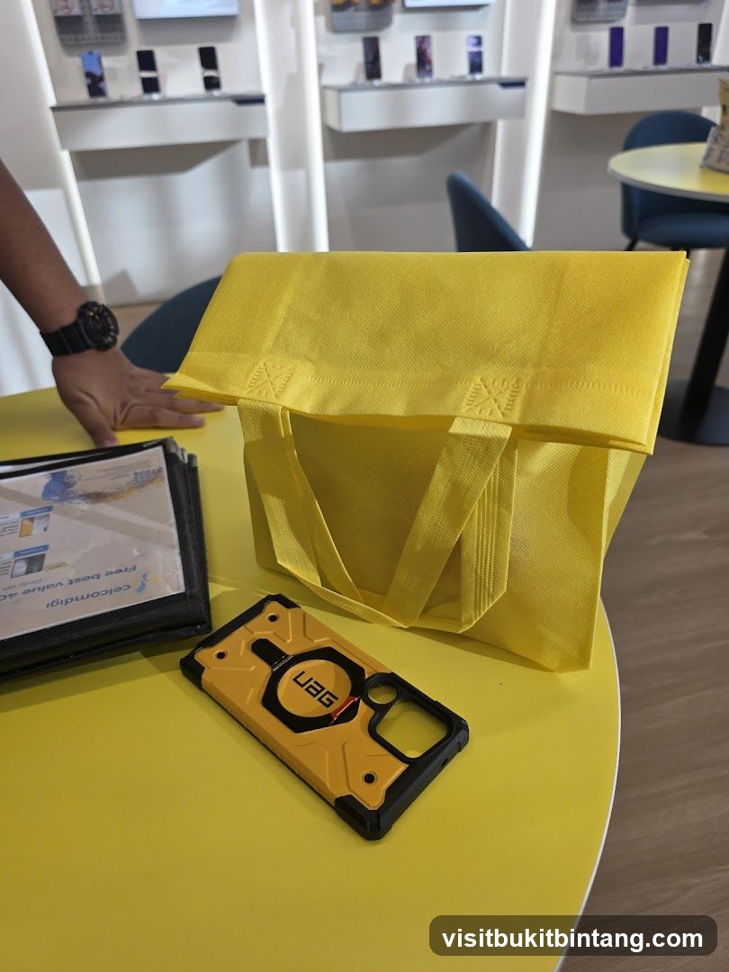 Yellow shopping bag and phone case on a table