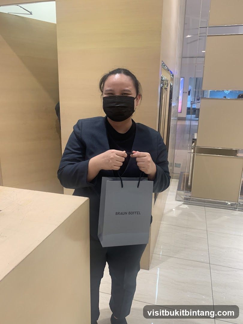 Person holding a shopping bag