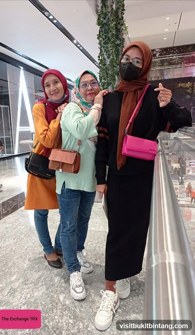 Three women posing for a photo