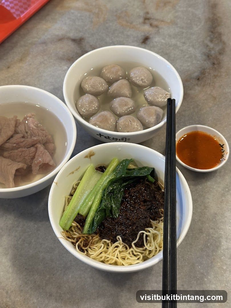 Noodles with Meatballs and Sliced Meat