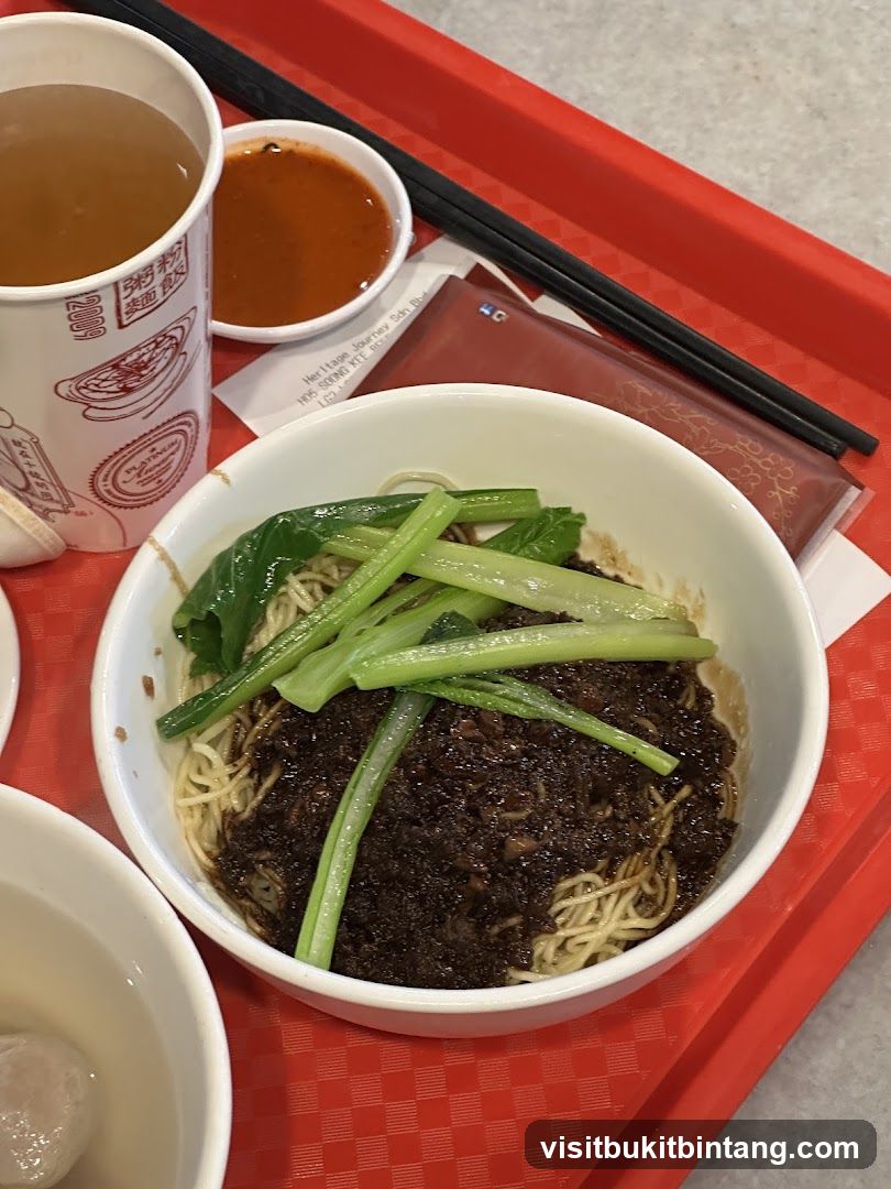 Noodles with sauce and greens
