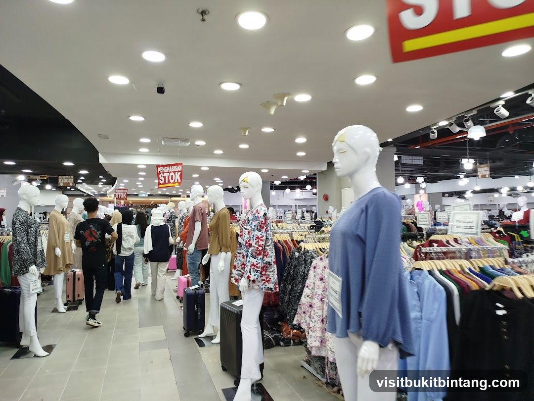 Clothing store interior with mannequins and clothing racks