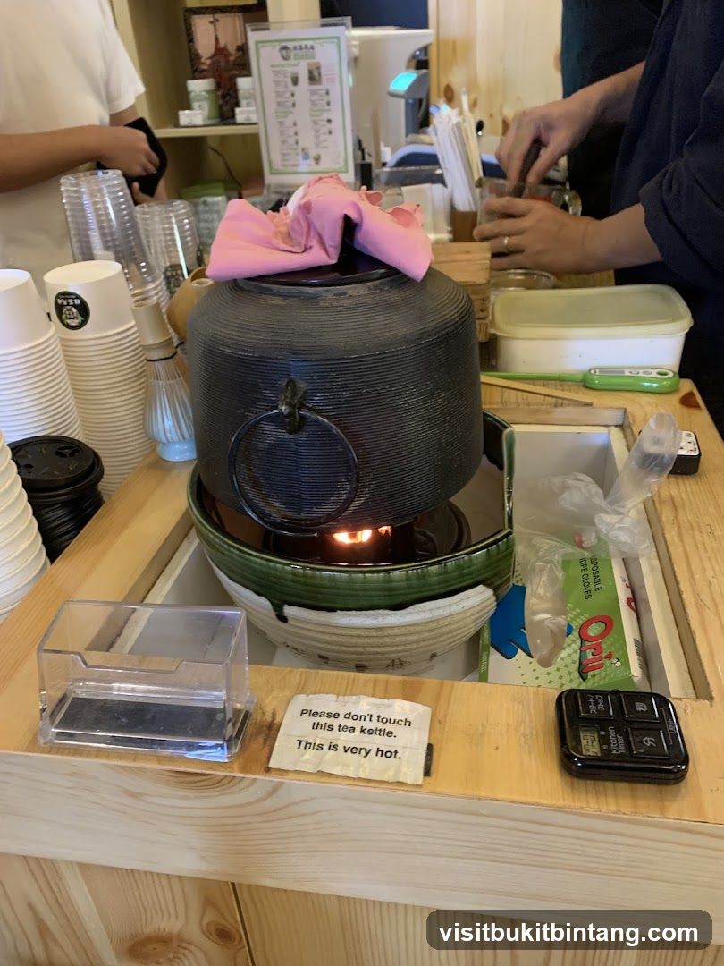 Tea Kettle with Warning Sign