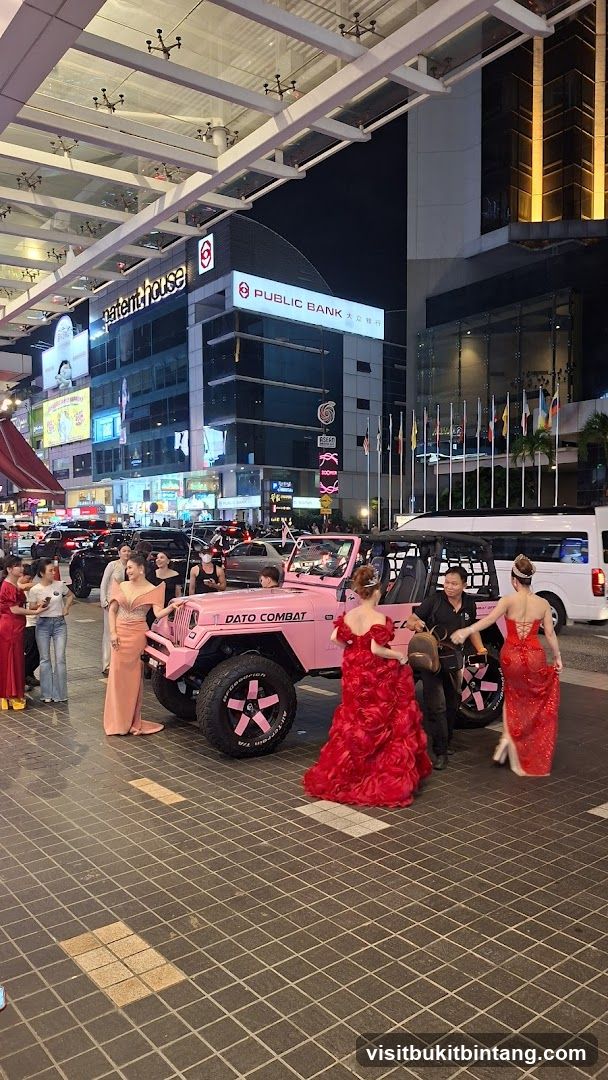 Pink Jeep with Women in Dresses