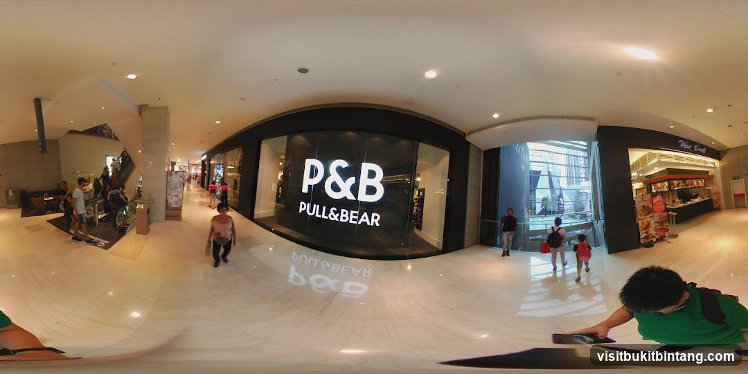 Mall Interior with Shops and People