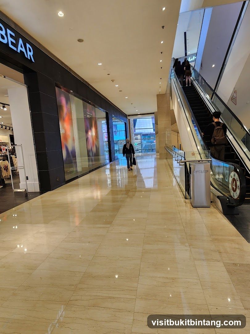 Mall Interior with Escalator and Storefront