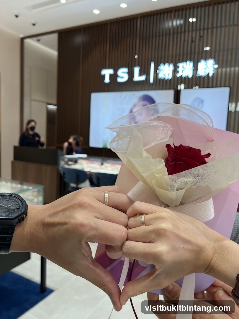 Couple showing off wedding rings