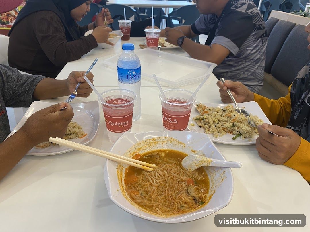 People eating at a food court