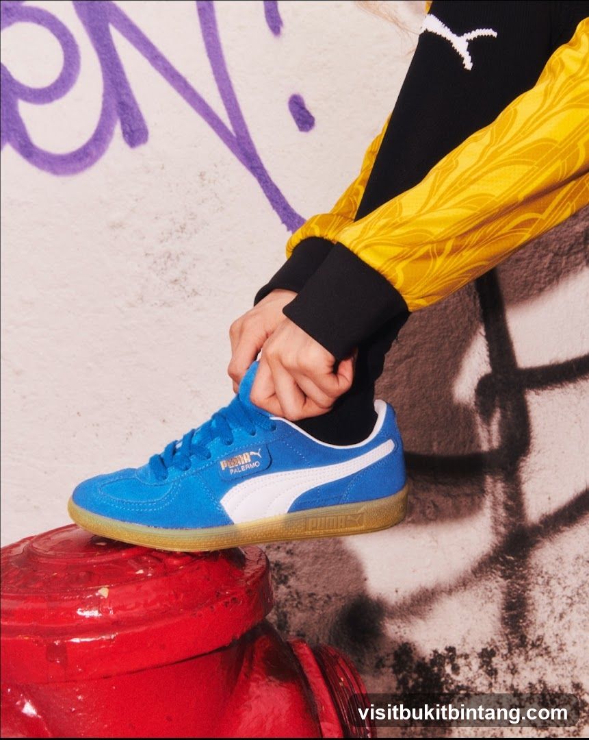 Puma Blue Sneaker on Red Fire Hydrant