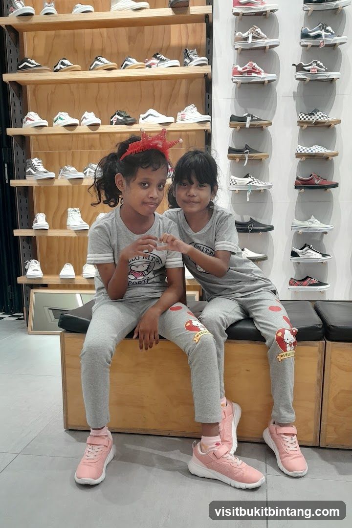 Two girls posing in a shoe store
