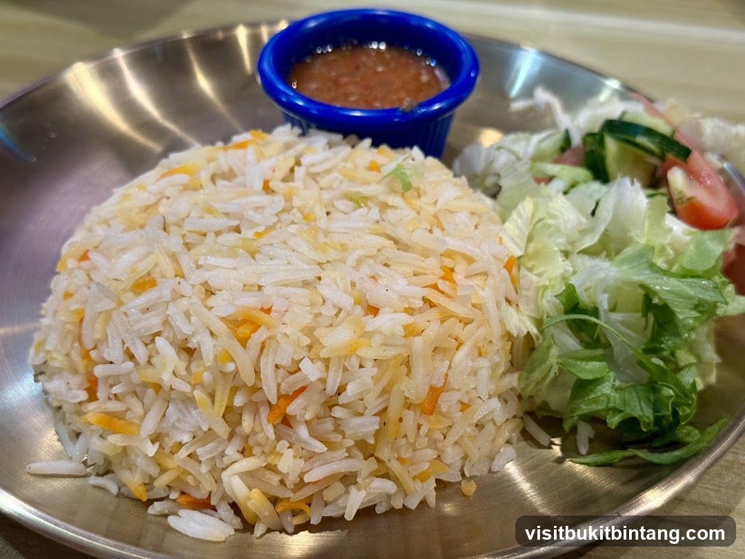 Rice Dish with Salad and Sauce