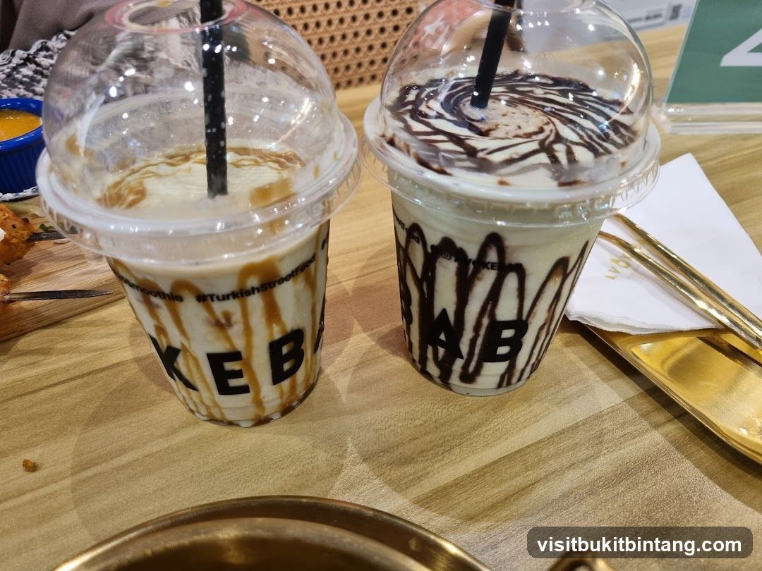 Two milkshakes with toppings
