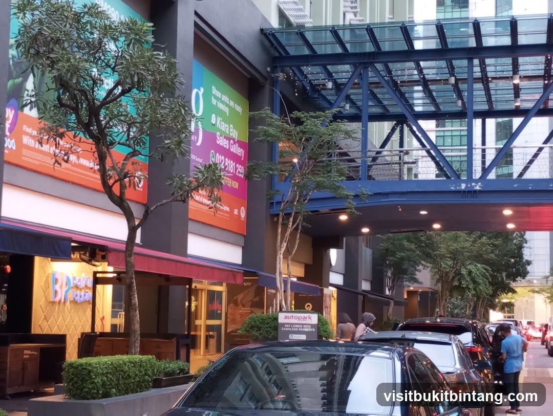 Street scene with shops and an elevated walkway