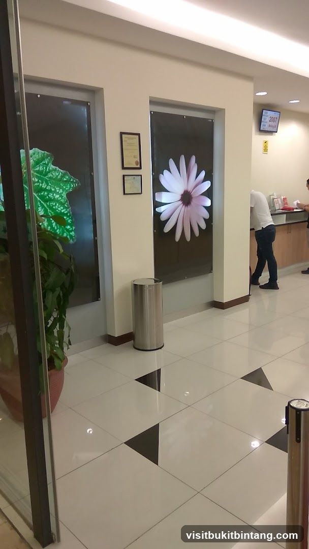 Interior of a building with artwork and a reception area
