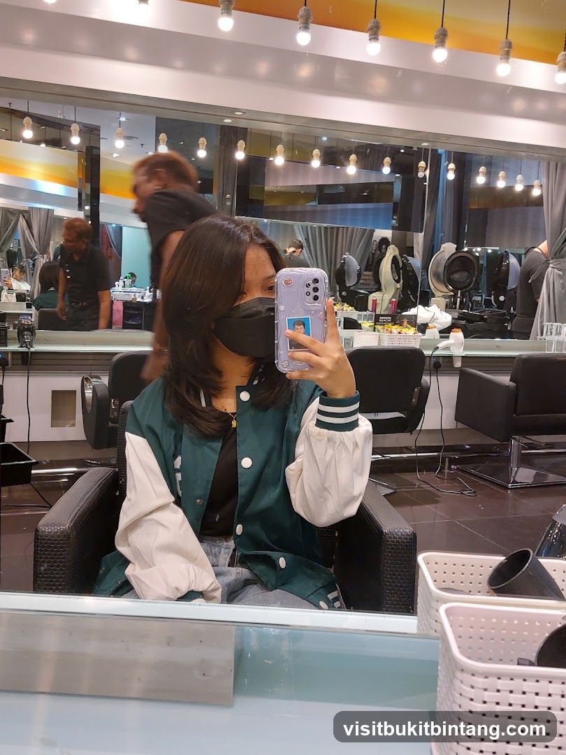 Woman taking a selfie in a salon