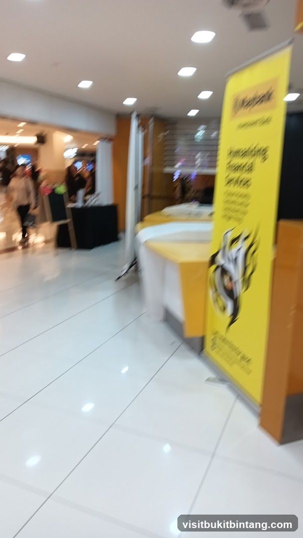 Mall interior with promotional banner