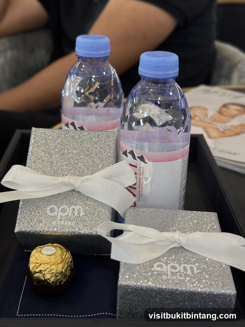 Gift presentation with jewelry boxes and water bottles