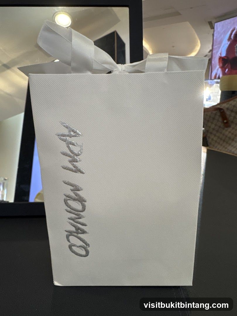 White Gift Bag with APM Monaco Logo