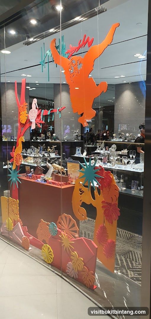 Store Window Display with Animal Silhouettes and Figurines