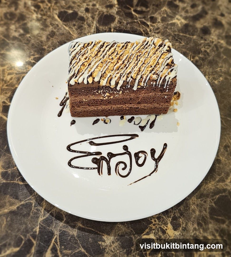Chocolate Cake with White Drizzle and Nuts