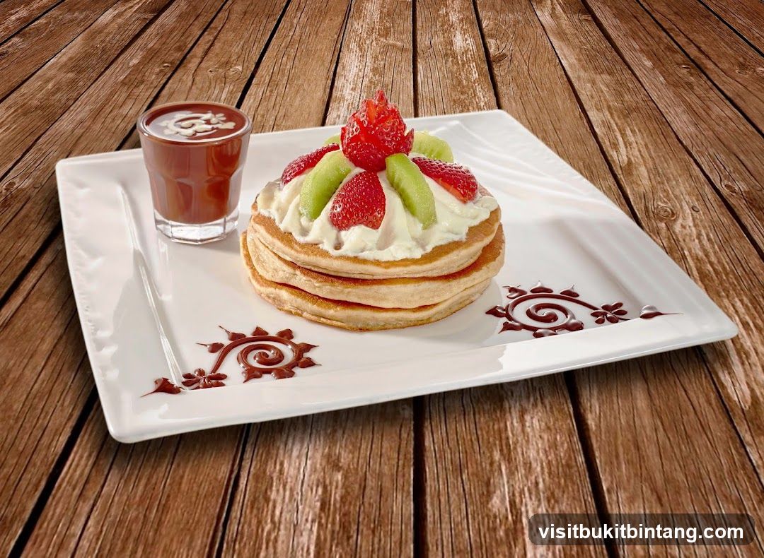 Pancakes with Fruit and Chocolate Sauce