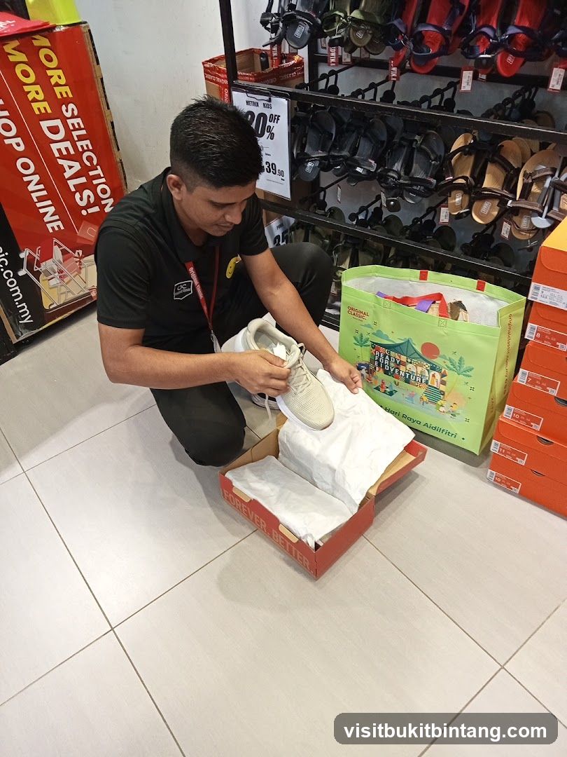Sales Associate Unboxing Shoes