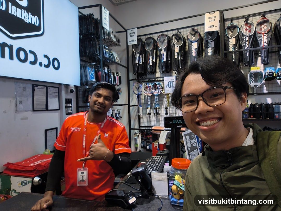 Sports store employee and customer