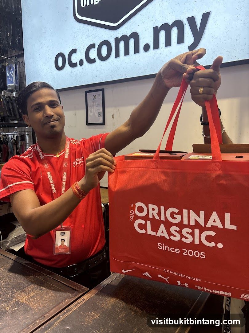 Man holding a branded shopping bag