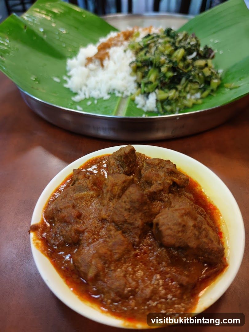 Indian Meal with Meat Curry and Rice
